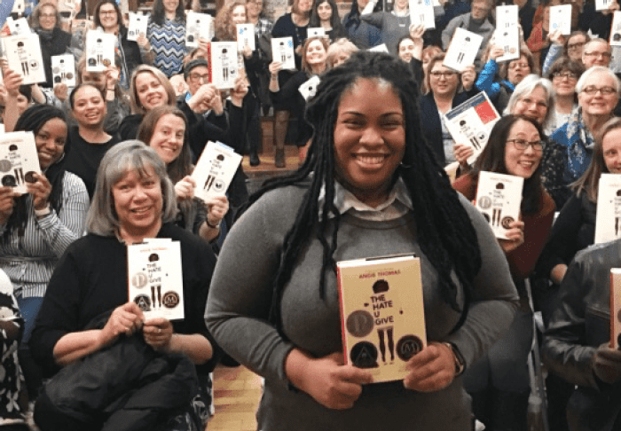 Group of women holding books