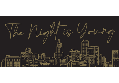 The Night is Young is written in gold script on a black background above a skyline sketched in gold.