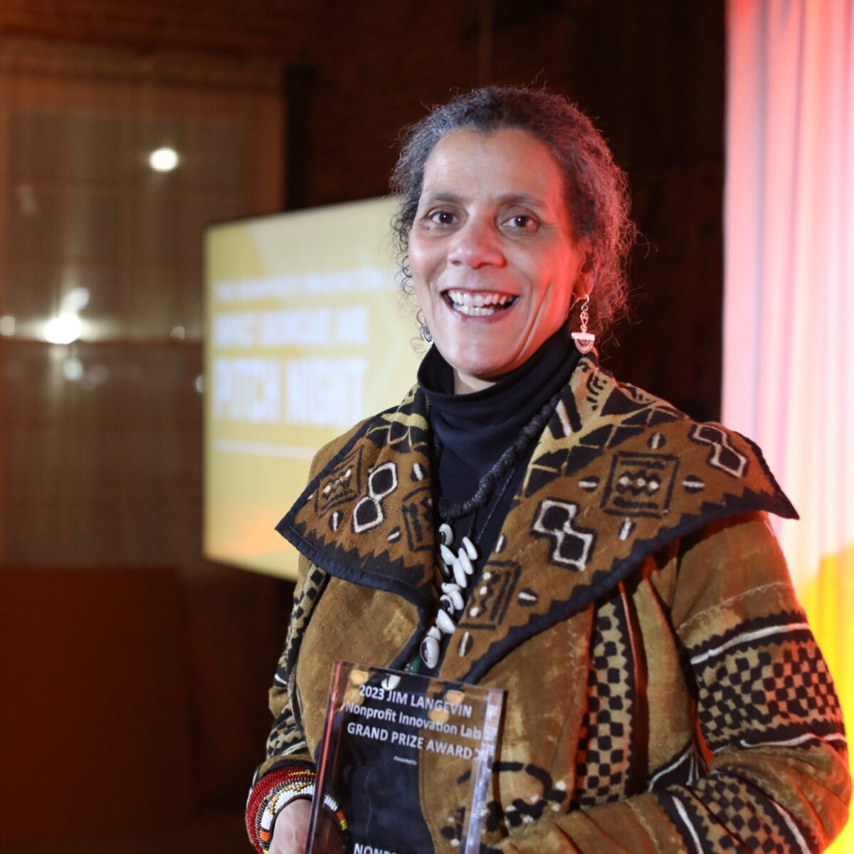 Valerie Tutson, executive/festival director and founding member of Rhode Island Black Storytellers, shows off her first place award.