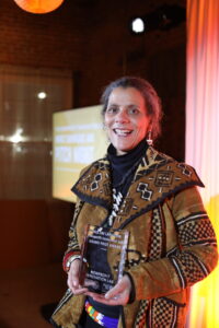 Valerie Tutson, executive/festival director and founding member of Rhode Island Black Storytellers, shows off her first place award.