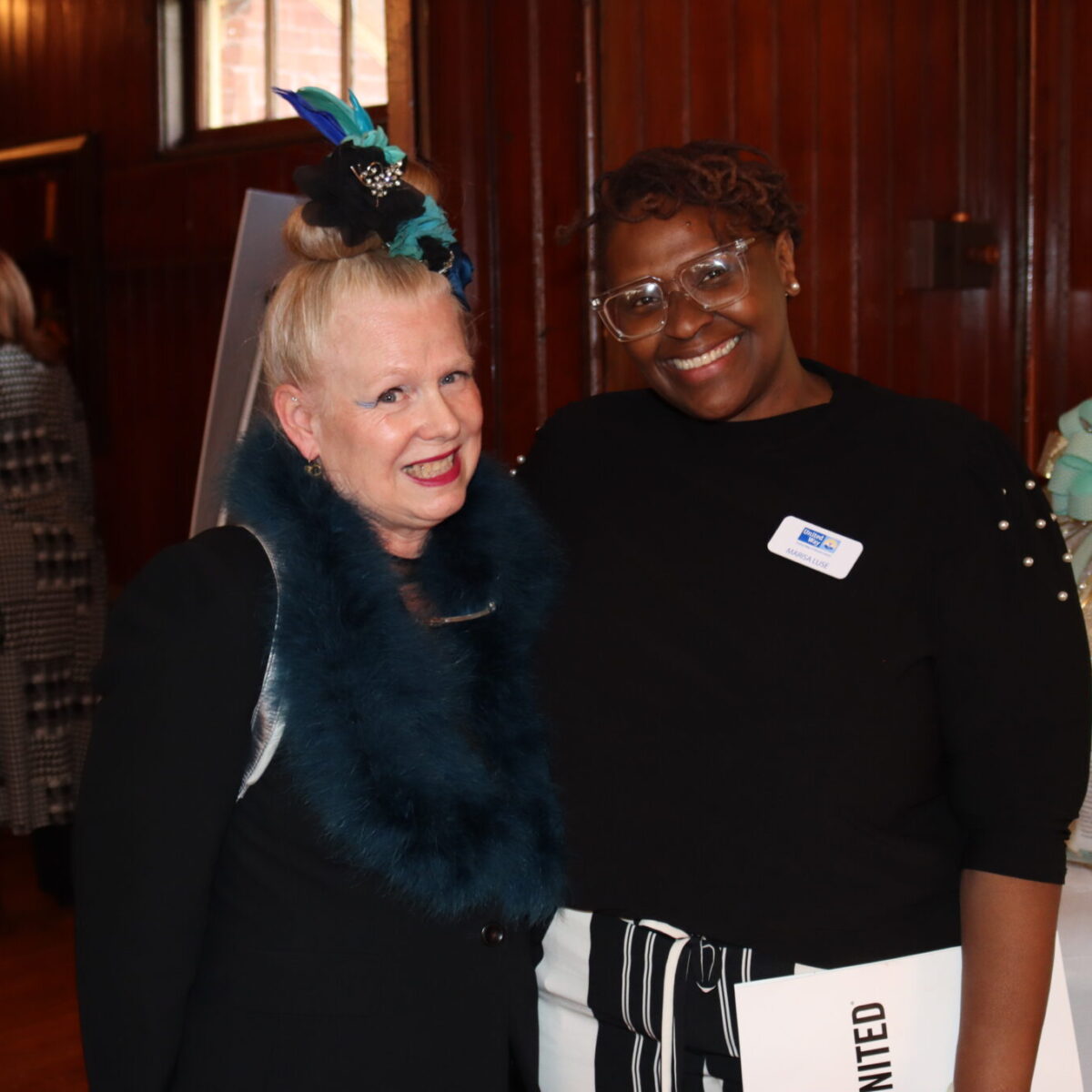 Gail Ahlers poses with Marisa Luse, program officer for United Way of Rhode Island.