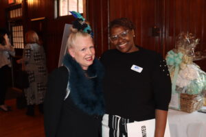 Gail Ahlers poses with Marisa Luse, program officer for United Way of Rhode Island.
