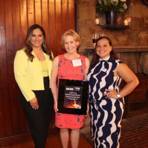 Peggy Lamb, outgoing chair of the Women United Executive Committee with Carla Rojo and Karen Alzate.