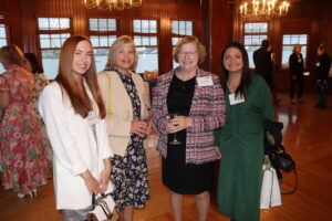 Women United members and friends pose for a photo.