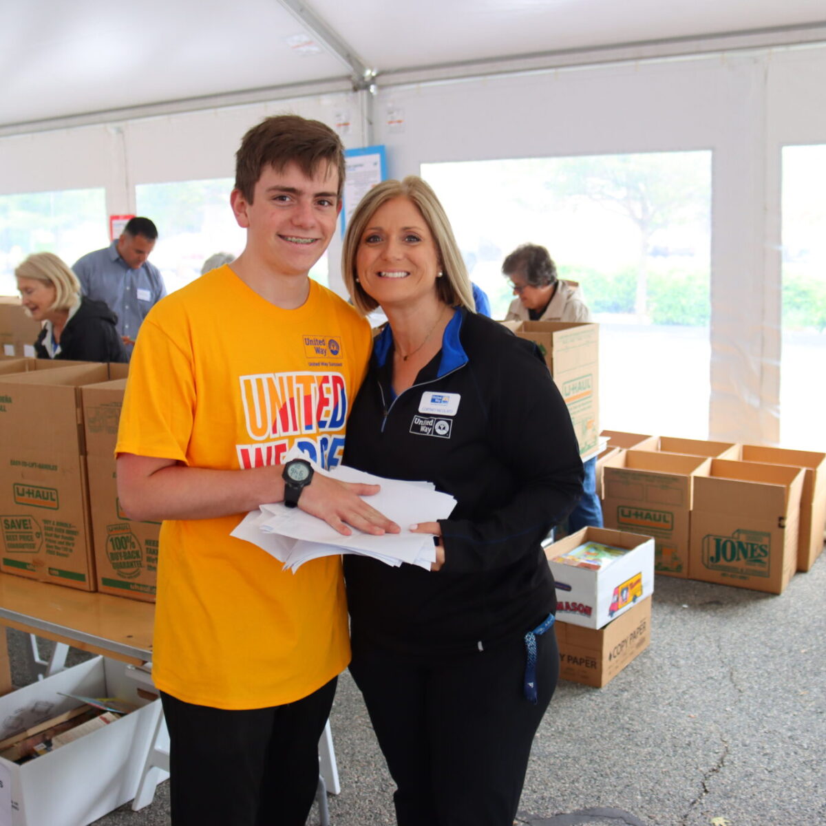 Cortney Nicolato, United Way of Rhode Island's president and CEO, poses with her son, Jacob.