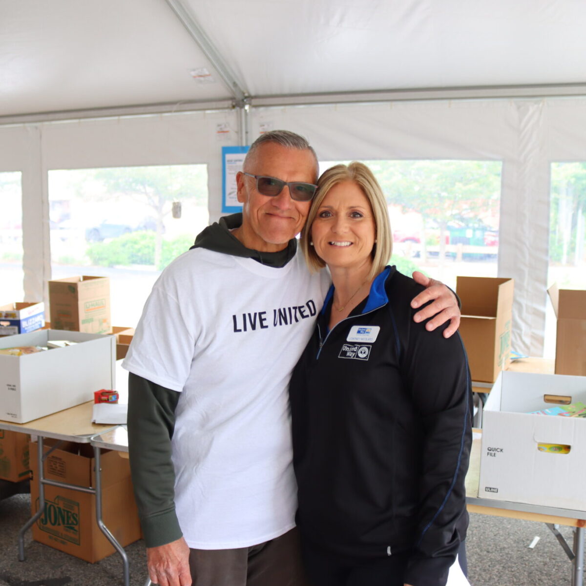 Cortney Nicolato, United Way of Rhode Island's president and CEO, poses with her dad, Tom Mahoney.