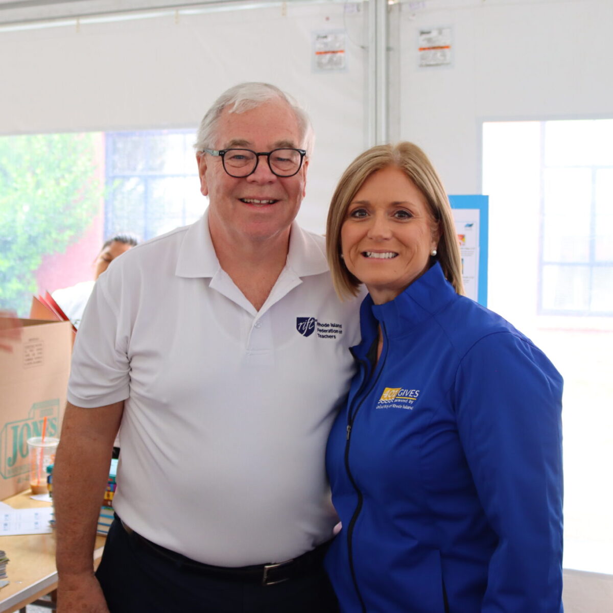 Cortney Nicolato, United Way of Rhode Island's president and CEO, poses with Frank Flynn, AFT VP.