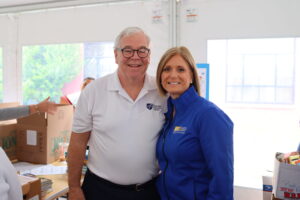 Cortney Nicolato, United Way of Rhode Island's president and CEO, poses with Frank Flynn, AFT VP.