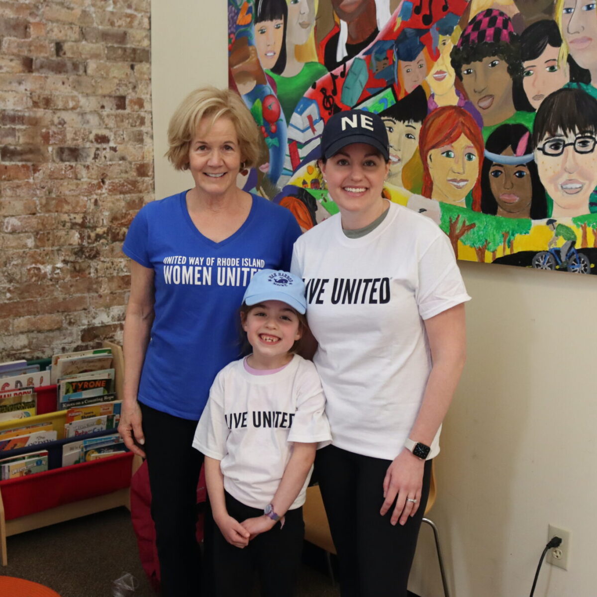 Peggy Lamb, outgoing chair of the Women United Executive Committee, poses with other volunteers.