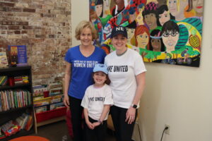 Peggy Lamb, outgoing chair of the Women United Executive Committee, poses with other volunteers.