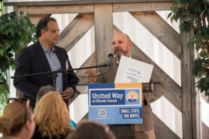 Mario Bueno, executive director of Progreso Latino, shares remarks.