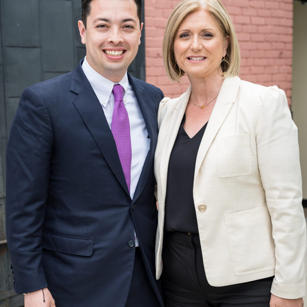 Cortney Nicolato, president and CEO of United Way of Rhode Island, poses with Rhode Island General Treasurer James Diossa.
