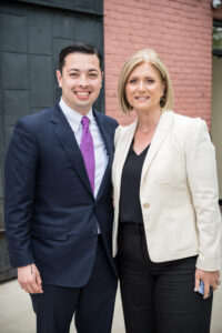 Cortney Nicolato, president and CEO of United Way of Rhode Island, poses with Rhode Island General Treasurer James Diossa.
