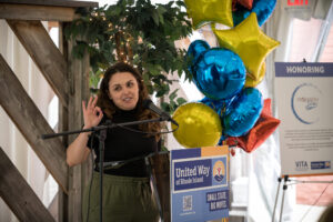 Marcela Betancur, executive director of the Latino Policy Institute, shares remarks.