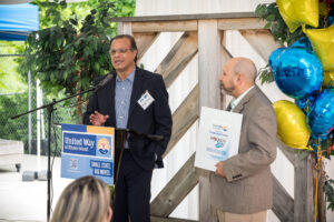 Miguel Bernal, Volunteer Income Tax Assistance coordinator at Progreso Latino, shares remarks.