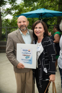 Mario Bueno, executive director of Progreso Latino, poses with Natalia Lima, vice president/community development market manager at Citizens.