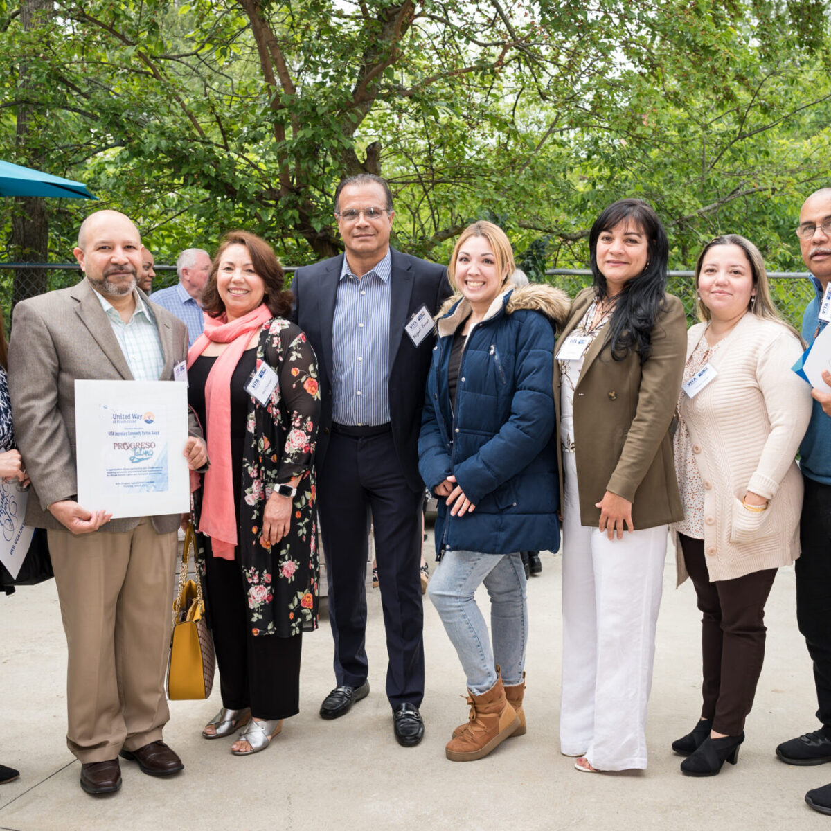 Progreso Latino staff and supporters pose with the VITA Legendary Community Partner Award.