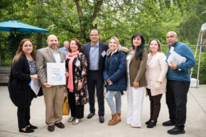 Progreso Latino staff and supporters pose with the VITA Legendary Community Partner Award.