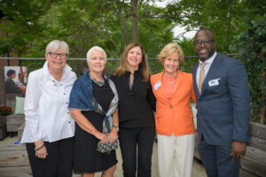 Roberta Butler, recipient of the Tocqueville United Award 2023, poses with other attendees.