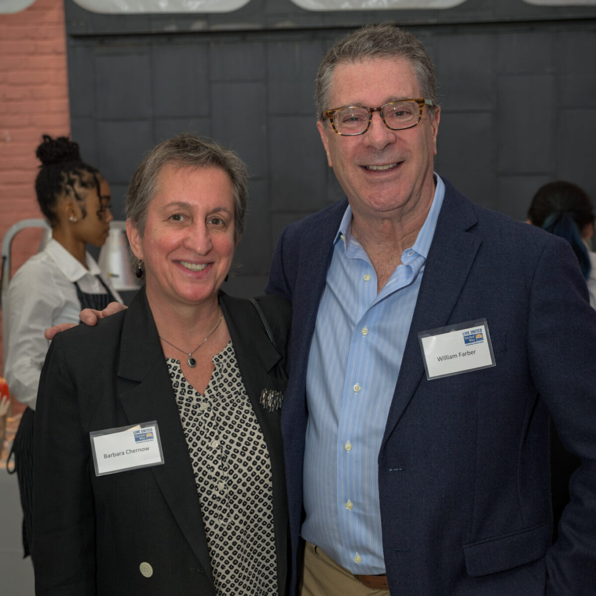 Barbara Chernow and William Farber, supporters of United Way of Rhode Island, pose for a photo.