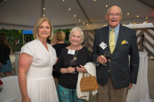Cortney Nicolato, United Way of Rhode Island's president and CEO, with Rena Lee and Nicholas Brown.