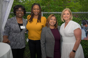 Cortney Nicolato, United Way of Rhode Island's president and CEO, poses with other attendees.