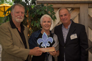 Roberta Butler and Bott Ikeler, recipients of the Tocqueville United Award 2023, with Dolph Johnson.