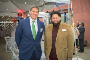 United Way of Rhode Island’s Rodney Davis and Rob Hancock pose for a photo.
