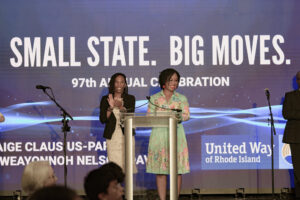 Paige Clausius-Parks and Weayonnoh Nelson Davies accepting the Community United Award.