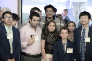 Karen Hazard, winner of the Dante F. Mollo Labor United Award, posing with her eight children.