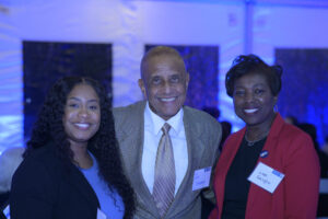 Jim Vincent and Lisa Ranglin posing with another attendee.