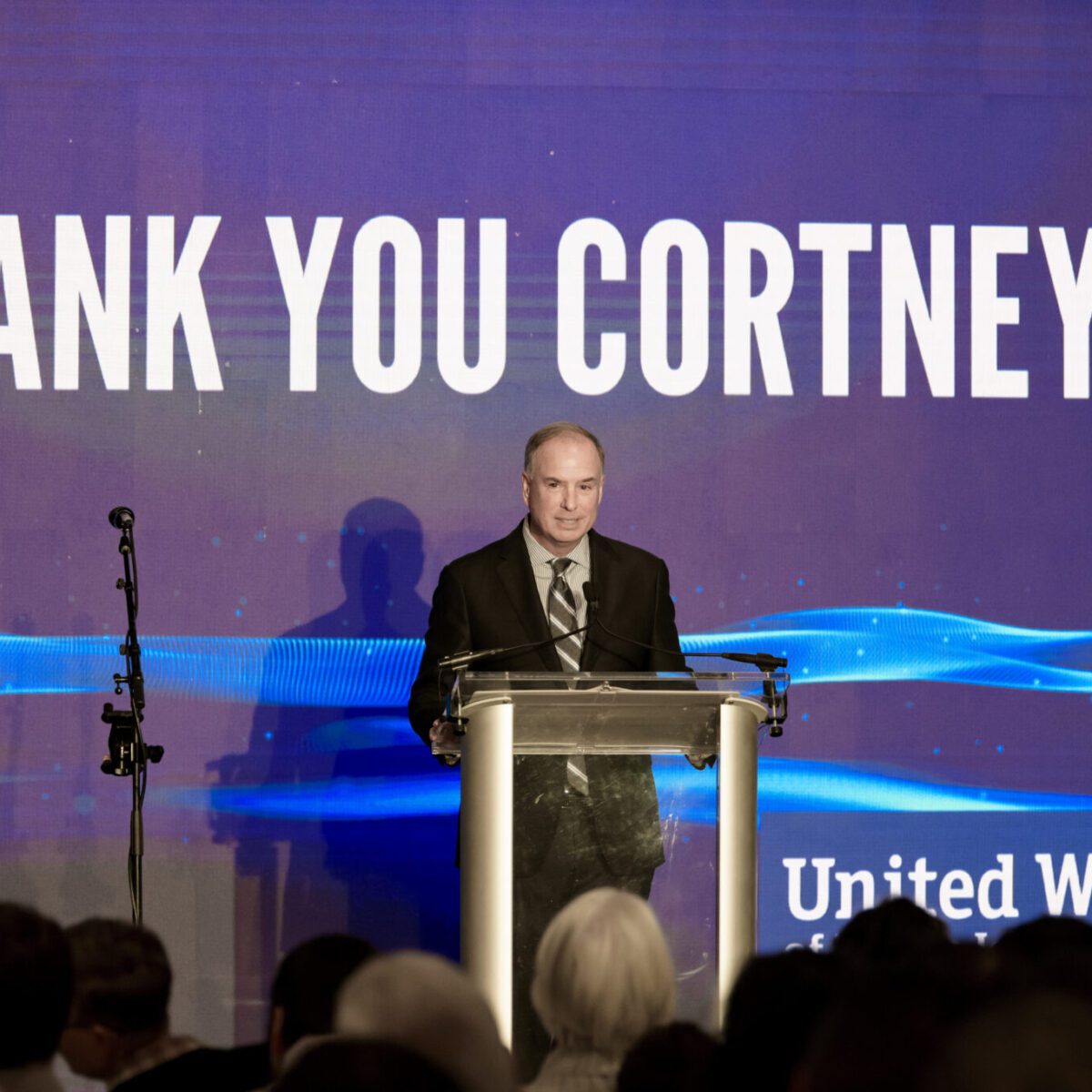 Dolph Johnson acknowledging Cortney Nicolato's fifth anniversary at United Way of Rhode Island.