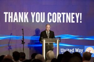 Dolph Johnson acknowledging Cortney Nicolato's fifth anniversary at United Way of Rhode Island.