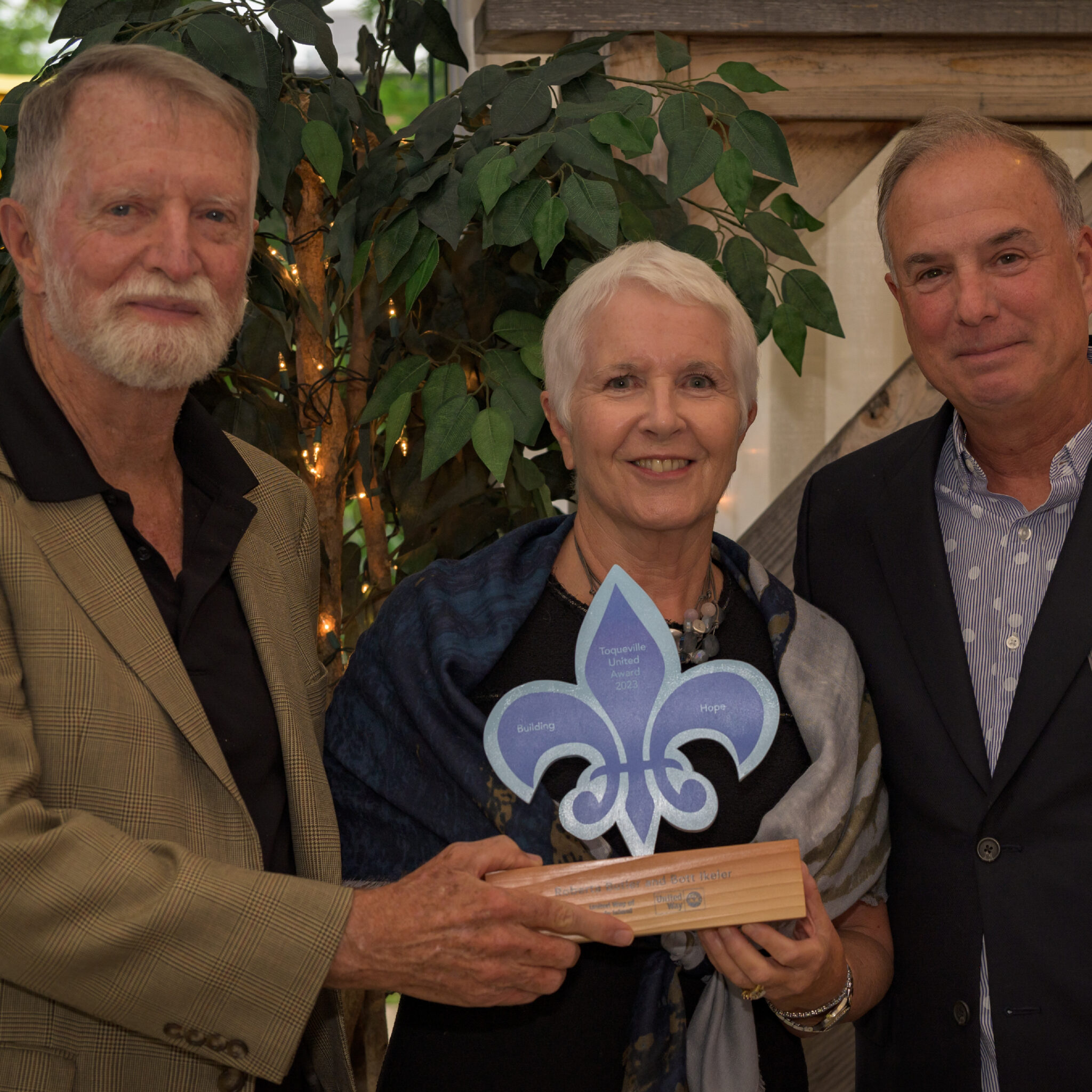 Roberta Butler and Bott Ikeler stand together as they are the 2023 Tocqueville United Award honorees.