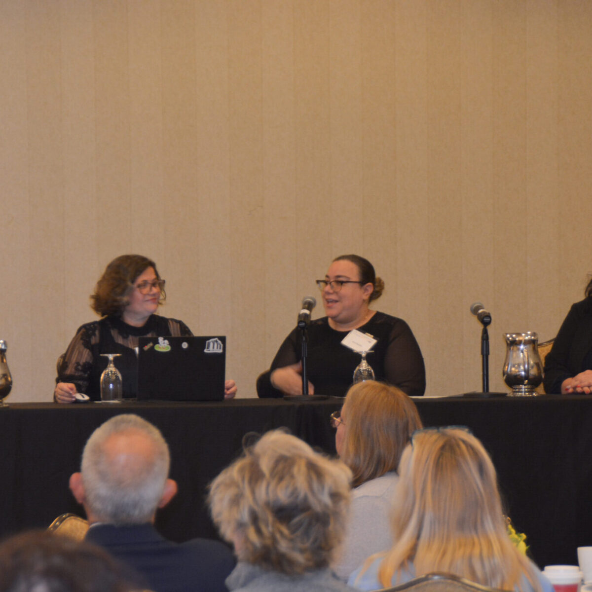 Aura Medina, Point program manager, speaking during a workshop with team members Cristina Amedeo and Mariana Moore.