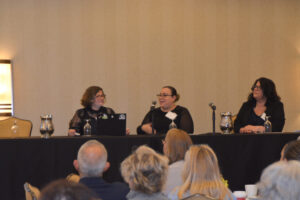 Aura Medina, Point program manager, speaking during a workshop with team members Cristina Amedeo and Mariana Moore.