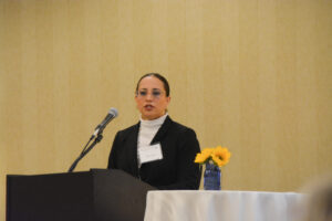 Maria Sol Cuesta, MyOptions RI advisor and lead satellite offices coordinator for Point, presenting a workshop.