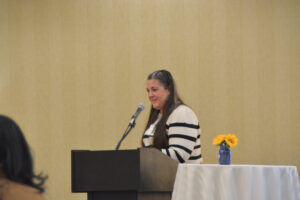 Kimberly Whiter, CEO of Elder Care Solutions, presenting a keynote speech.
