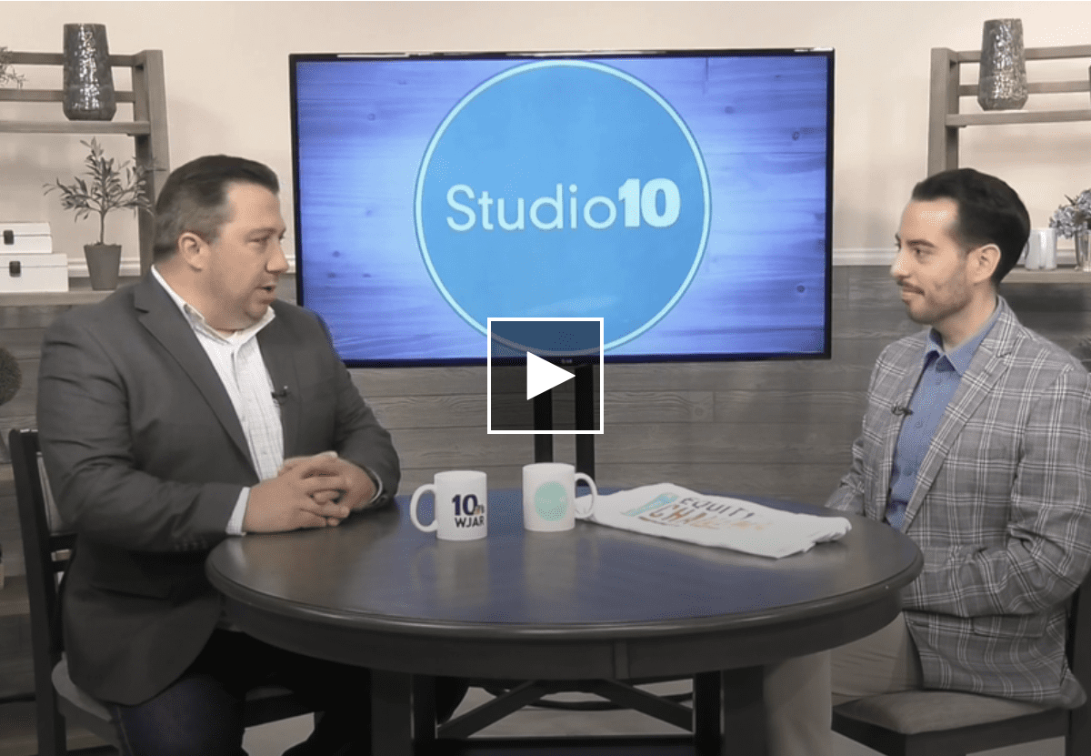 Studio10's Ben DeCastro talking with Kevin Matta, senior director of people and culture for United Way of Rhode Island.