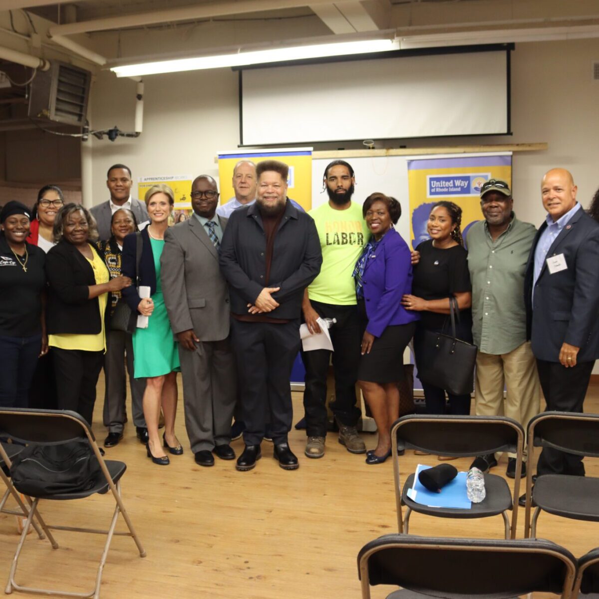 Members of Team United posing with several Providence City Council members and other community partners.