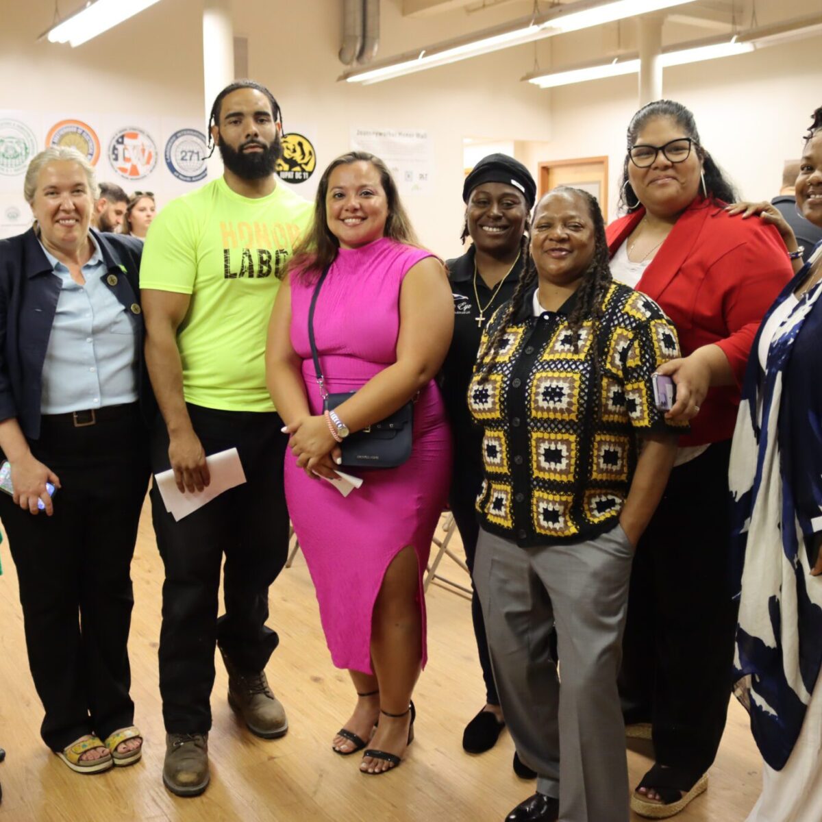 Members of Team United posing with Providence City Council President Rachel Miller and other community partners.