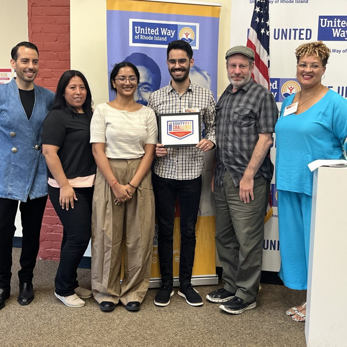 United Way of Rhode Island's Kevin Matta and Lifespan's Christin Zollicoffer with three Economic Progress Institute staff.