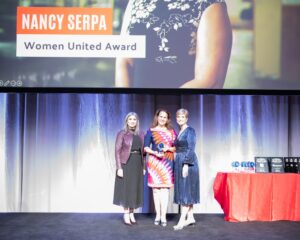 Nancy Serpa, recipient of the Women United Award, posing with Cortney Nicolato and Paola Fernandez.