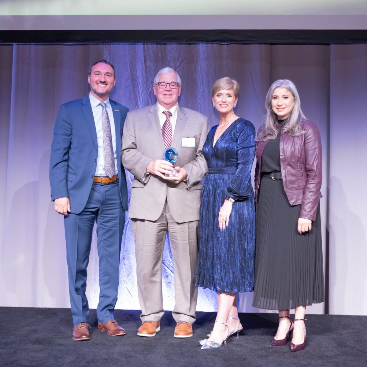 Frank Flynn, recipient of the Dante F. Mollo Labor United Award, with Chris Sabitoni, Cortney Nicolato, and Paola Fernandez.