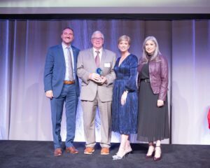 Frank Flynn, recipient of the Dante F. Mollo Labor United Award, with Chris Sabitoni, Cortney Nicolato, and Paola Fernandez.