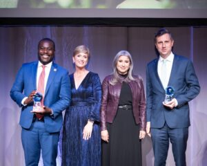 Congressmen Seth Magaziner and Gabe Amo, recipients of the Community United Award, with Cortney Nicolato and Paola Fernandez.