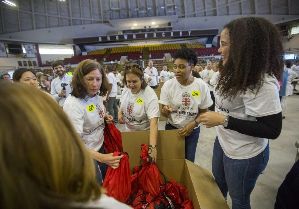 Brown staff members broke the world record for most backpacks filled with school supplies during the 2018 staff development day.