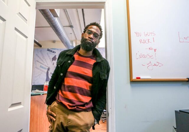 bf10b393-4577-4cb7-ab2e-0081f2f167f2-Justin_Thomas_ Justin Thomas has made large strides toward building a new life in Rhode Island during and after his time in prison, but he remains saddled with court-related debt that will weigh on him for many years. He is among many people who may benefit from a new program that can reduce fines and fees, but not restitution. David DelPoio/The Providence Journal